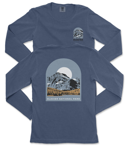 A long-sleeved blue t-shirt with a graphic design depicting a mountain landscape and the text "Glacier National Park" printed on it.