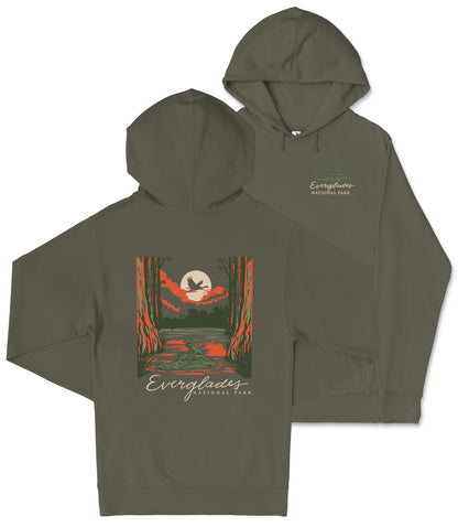 A hooded sweatshirt with a graphic design depicting a sunset over a forest, with the text "EVERGLADES NATIONAL PARK" printed on it.