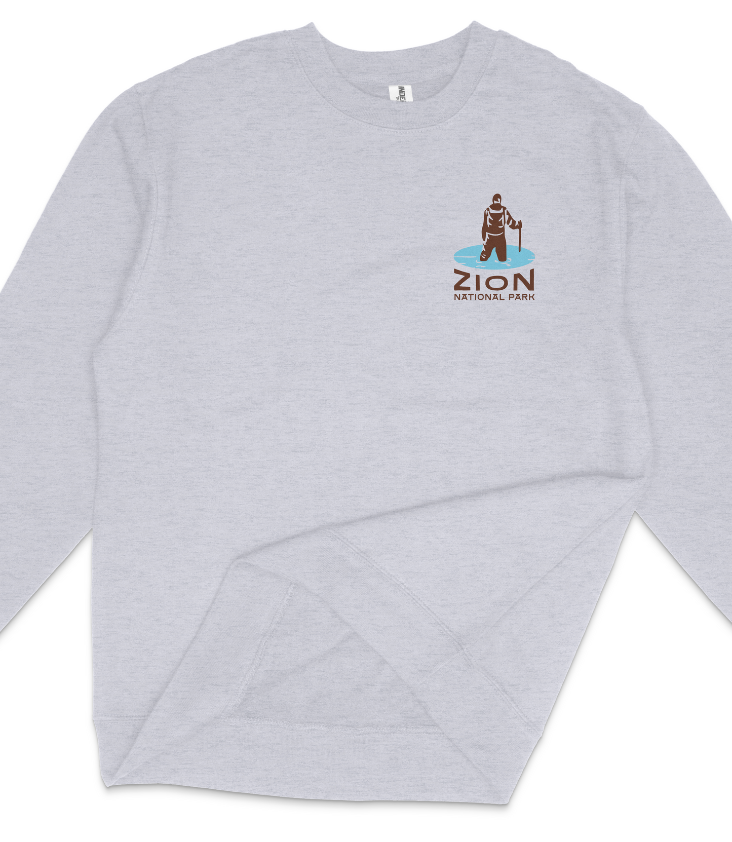 A gray long-sleeved shirt with a logo on the left side.