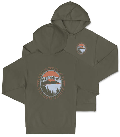 A hooded sweatshirt with a graphic design on the back, featuring a circular emblem with a mountain landscape and the text "Cater Lake National Park Oregon".