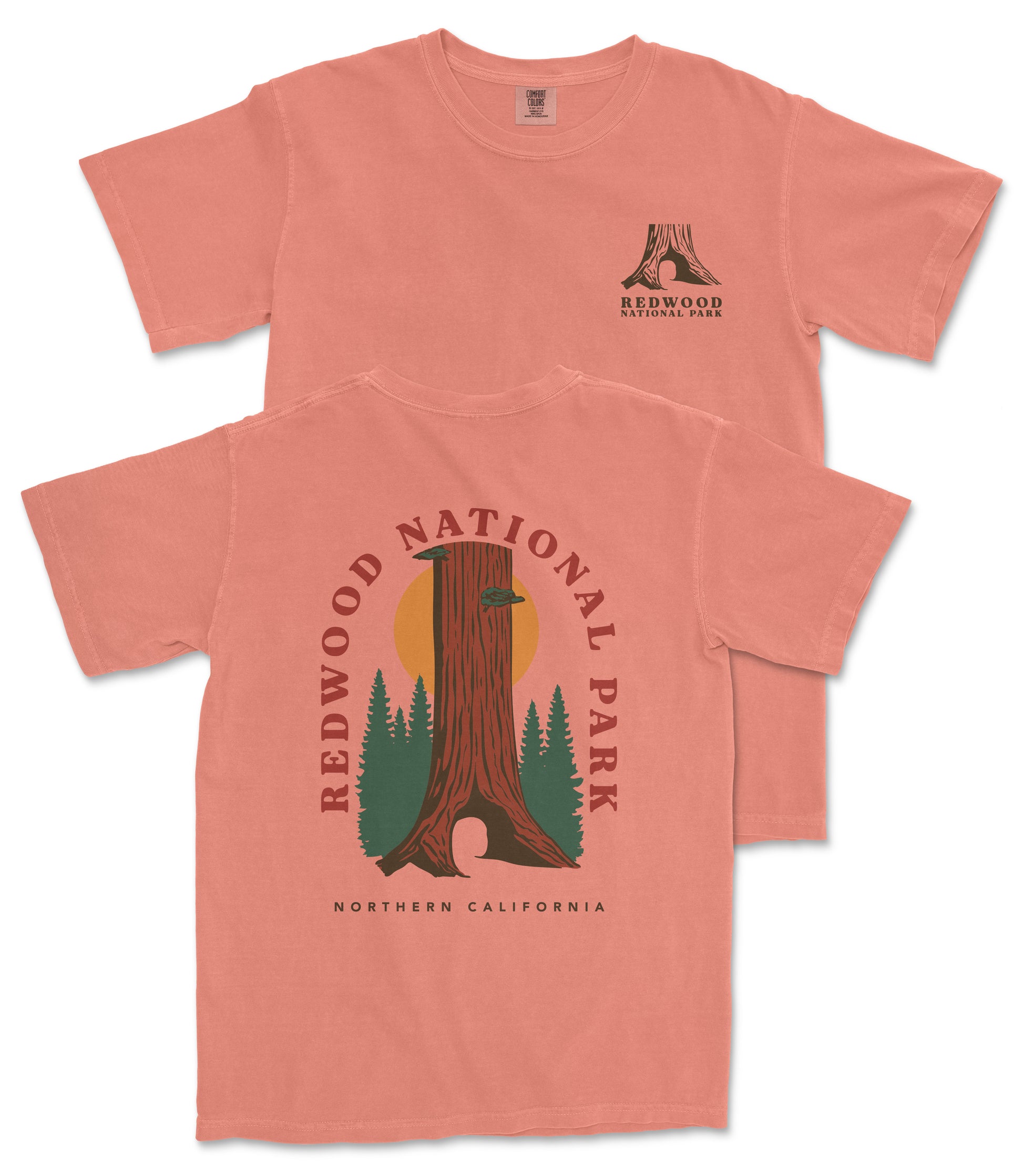 a pink t-shirt with a graphic design depicting a redwood tree and the text "REDWOOD NATIONAL PARK NORTHERN CALIFORNIA".