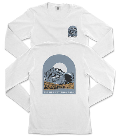 A white long-sleeved t-shirt with a graphic design depicting a mountain landscape and the text "GLACIER NATIONAL PARK" printed on it.
