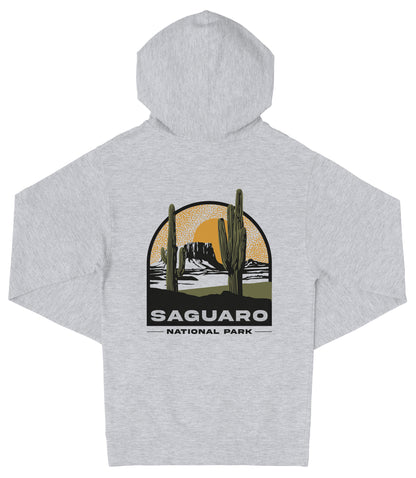A gray hooded sweatshirt with a graphic design depicting a desert landscape with cacti and mountains, along with the text "Saguaro National Park".