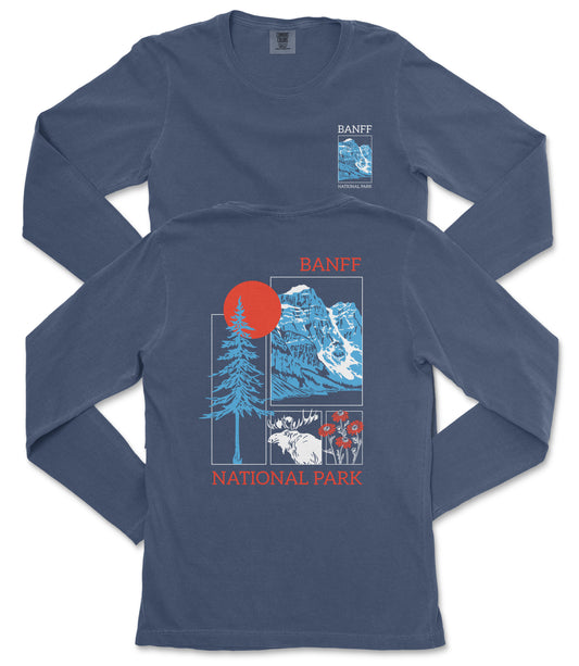 a long-sleeved blue t-shirt with a graphic design depicting a mountain range, a tree, and a moose. The design also includes the text "BANFF NATIONAL PARK" and "BANFF" in the top corners.